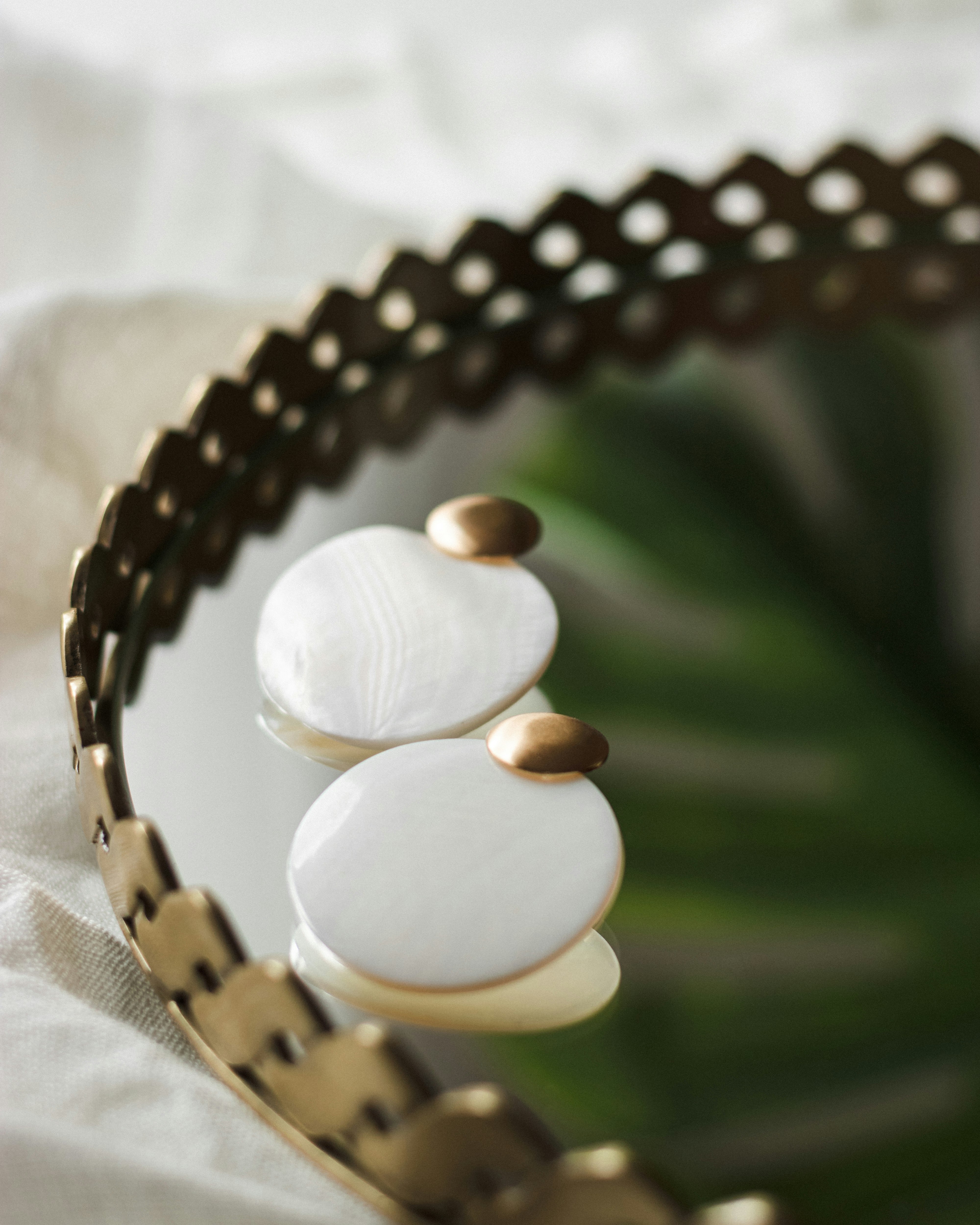 gold and white beaded bracelet